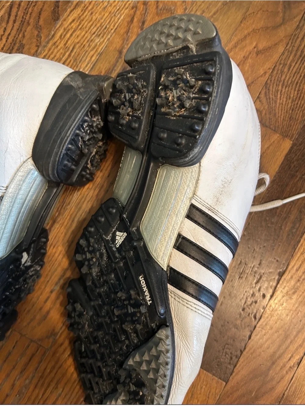 adidas White Athletic Shoes with Black Stripes